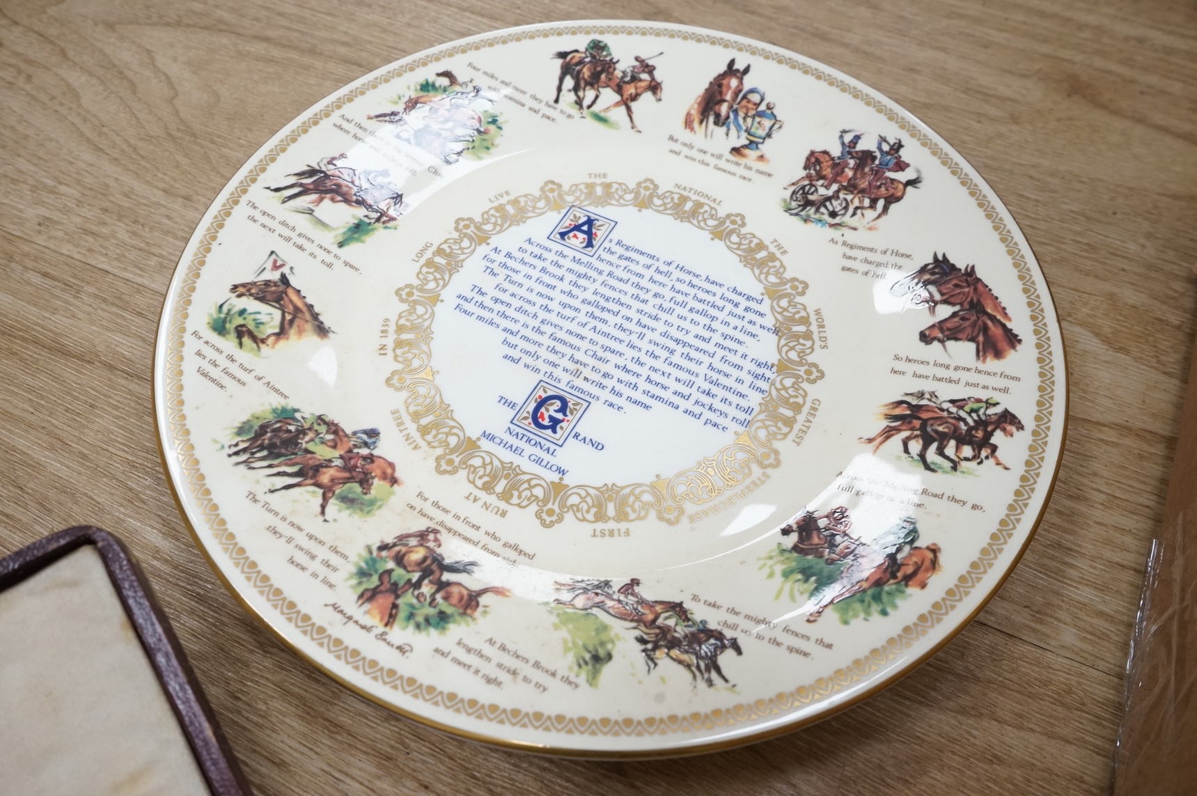 A quantity of plated cutlery, a Royal Doulton limited series sporting mug by Teofani and an Aynsley plate, 27.5cm diameter.